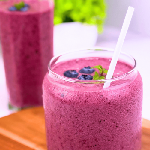 Blueberry basil smoothie in a glass