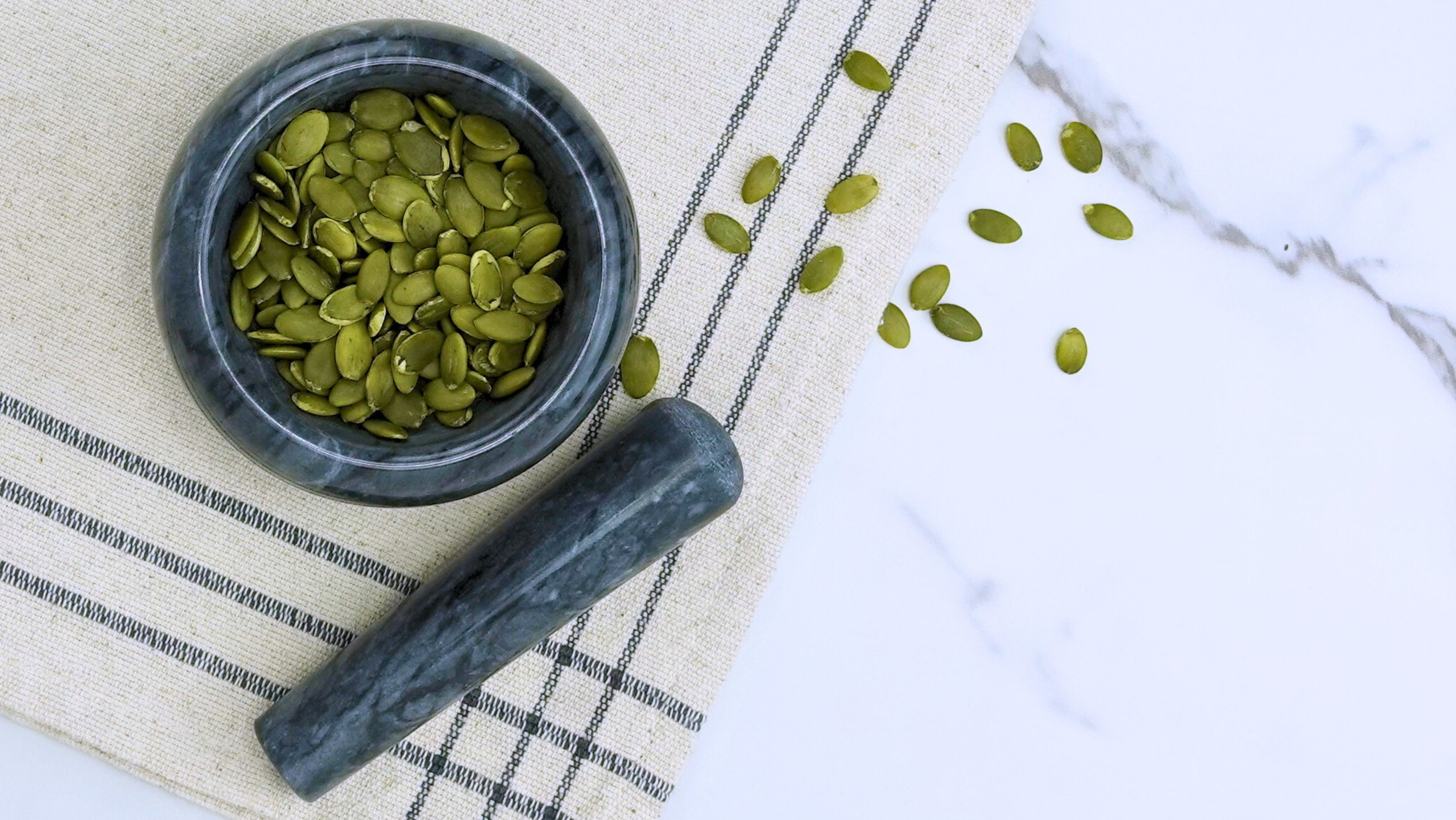 Close up of pumpkin seeds ready for grinding scaled