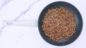 Close-up of fried meat for taco salad, seasoned and ready to use.