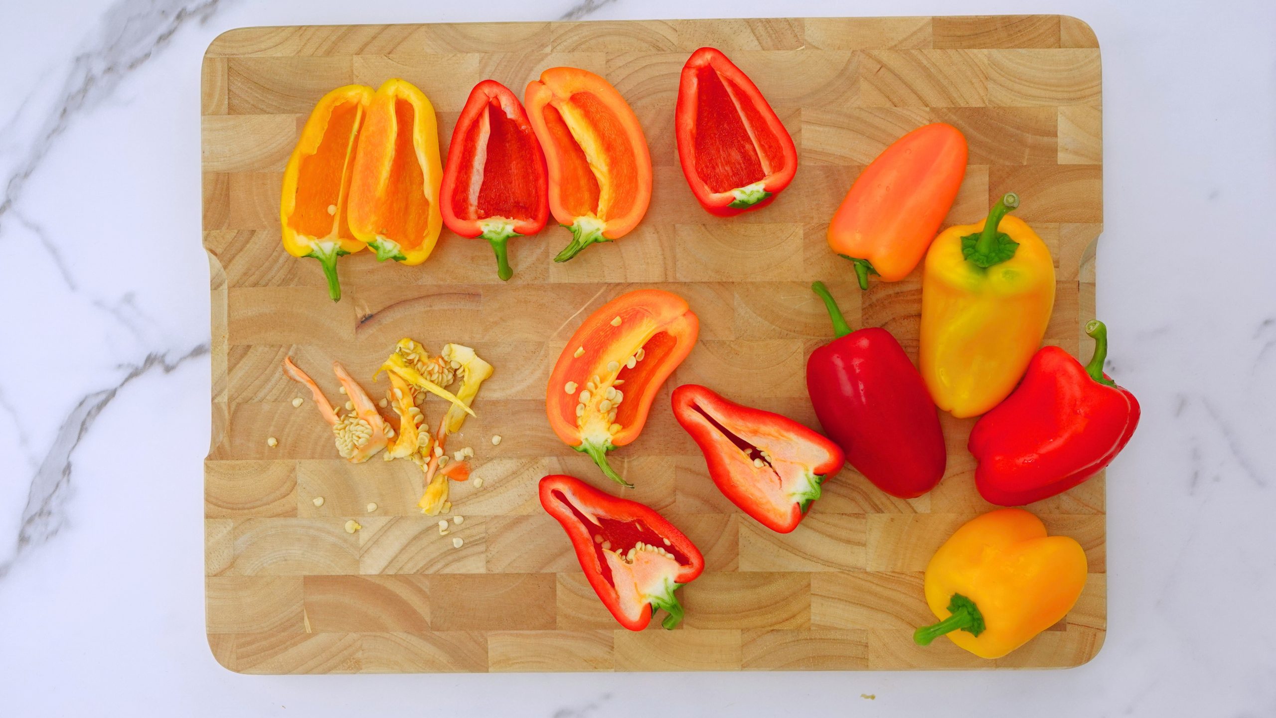 Prepearing Peppers for stuffing with chicken scaled