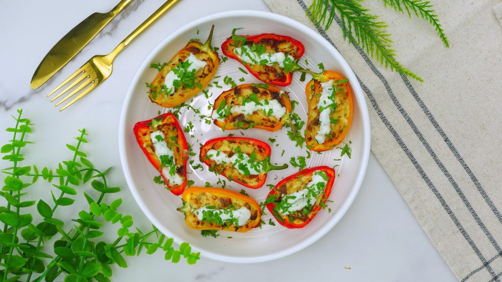 Close-up of smoky ranch chicken bites garnished with parsley.