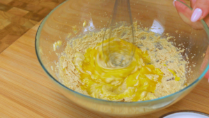 Adding egg and whipping butter mixture.