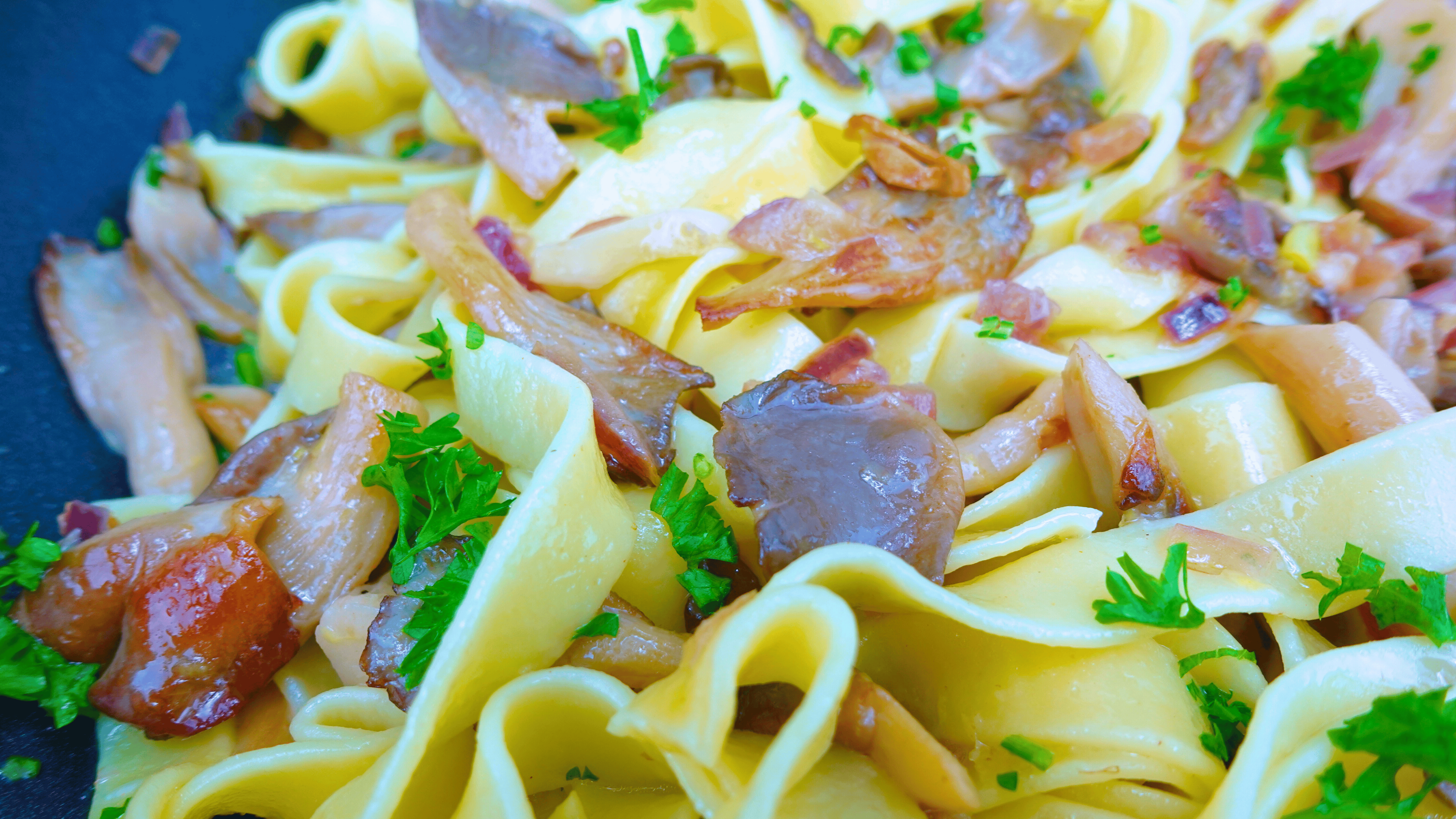 Close-up of pasta with mushrooms.