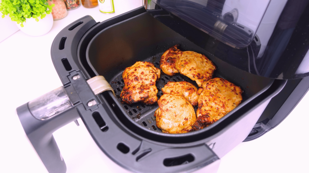 Crispy cooked chicken thighs in the air fryer.