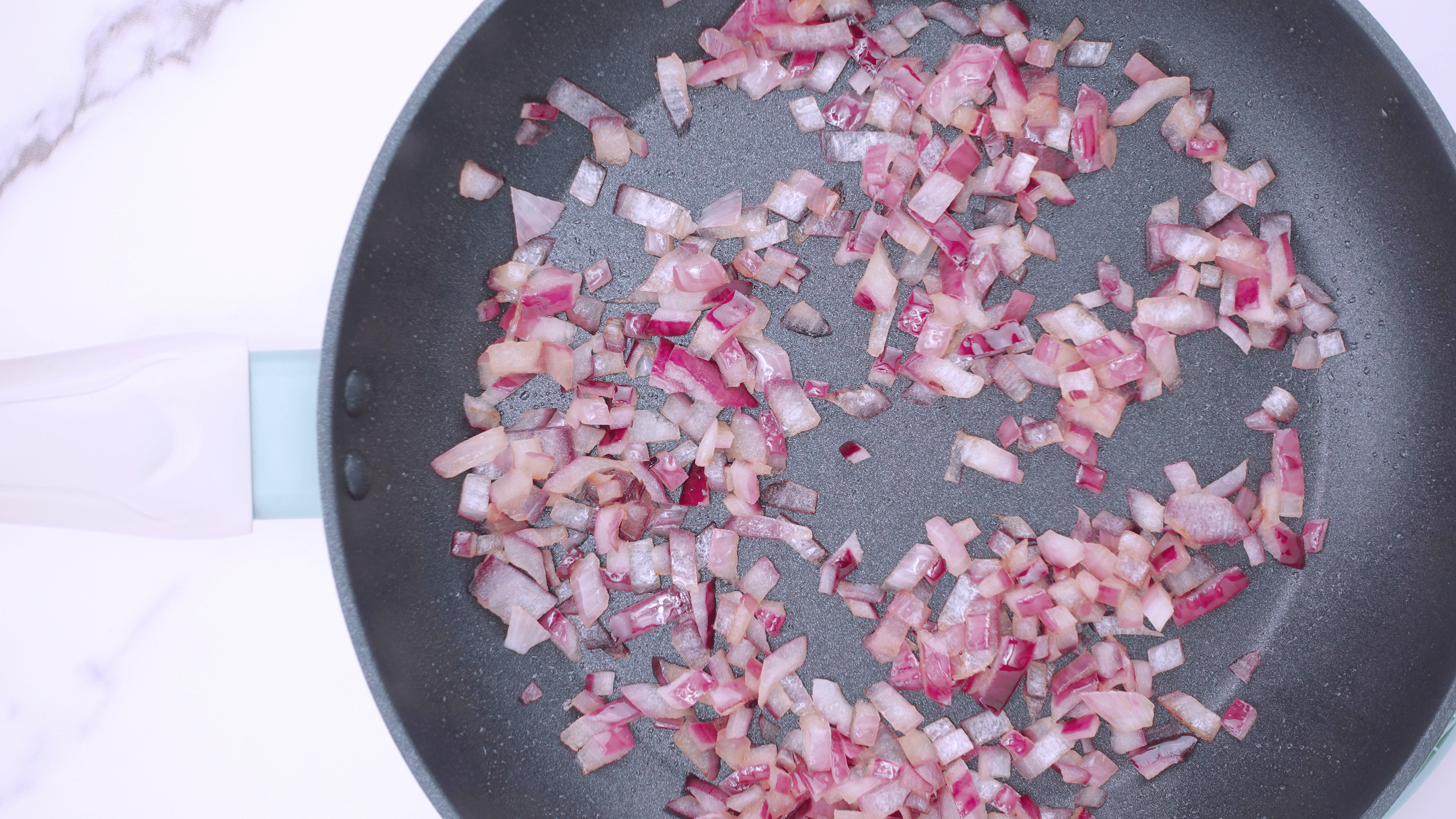 cooking ground beef with onion and garlic in olive oil