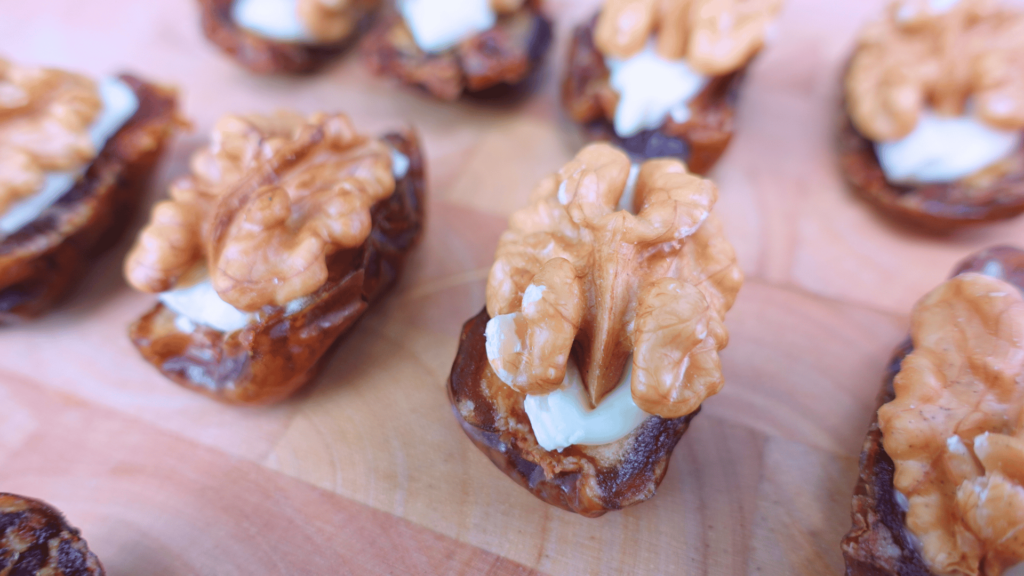 Close-up of dates stuffed with walnuts.