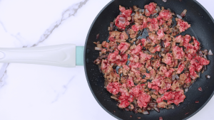 Ground beef cooked to a golden brown, seasoned with onion and garlic powder.