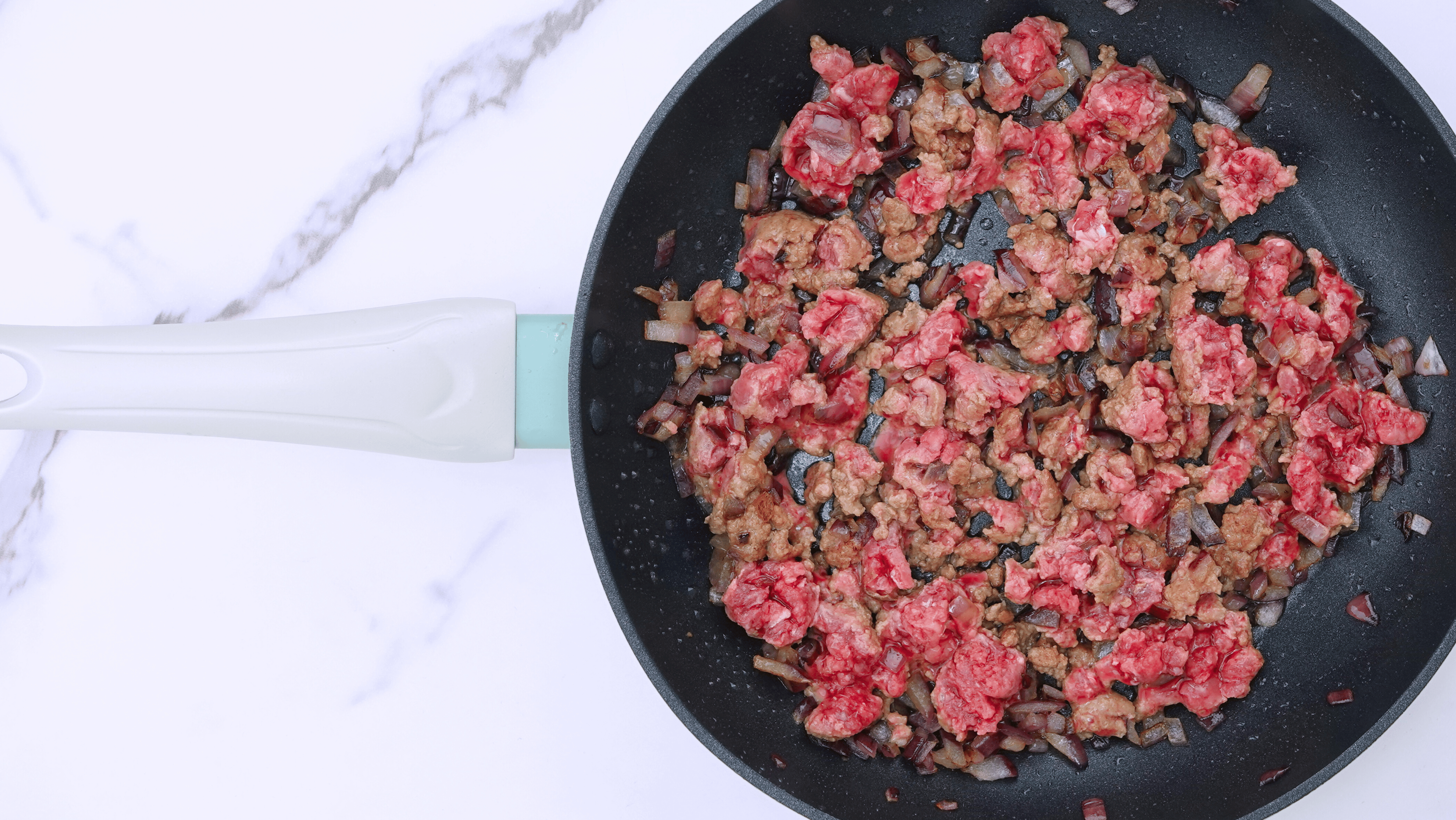 golden brown ground beef with onion and garlic powder