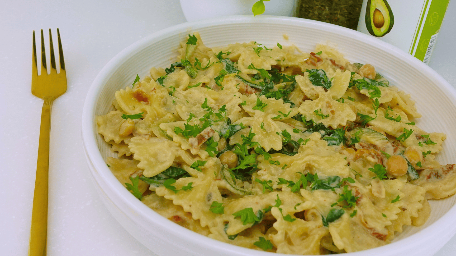 High-protein Marry Me Pasta ready to serve, topped with fresh basil and cashew sauce.