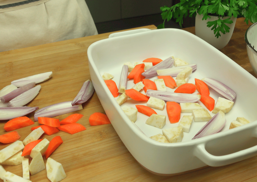 Chopped celery, shallots, and carrots prepared for cooking.