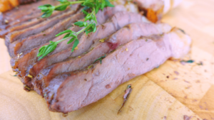 Close-up of sliced steak pieces.