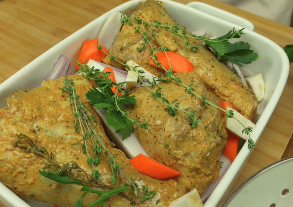 Lamb shanks resting at room temperature before cooking.